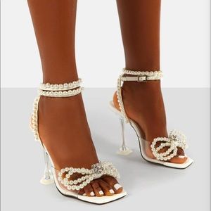 PUBLIC DESIRE GLIMMER WHITE WRAP AROUND PEARL BOW SQUARE TOE CAKE STAND HEELS